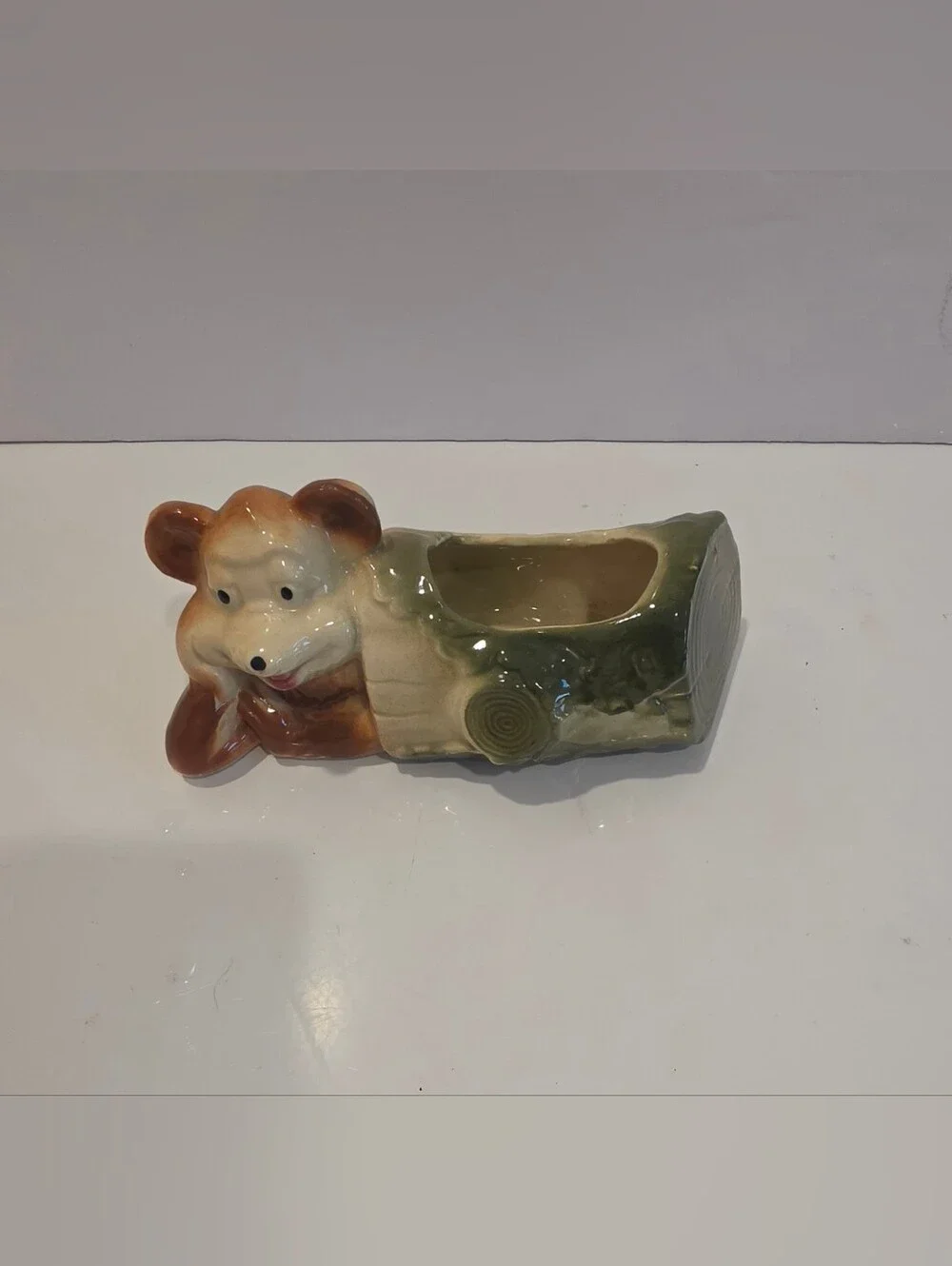 Vintage Ceramic Planter Featuring A Whimsy Bear Lounging Next To A Log.